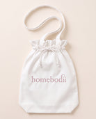 homebodii tote bag drawstring flat lay